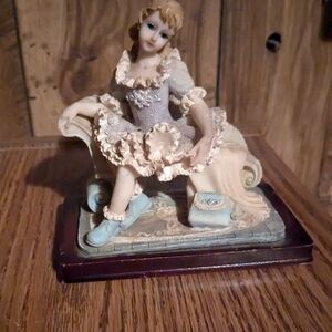 Little Girl on Couch Figurine